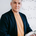 Professional instructor Olga Zarichna smiling confidently